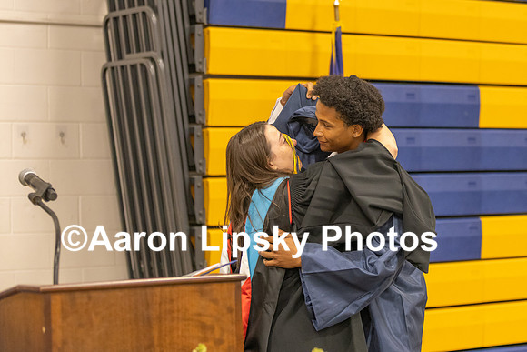 Alexis Harris presents the Faculty Award to graduating senior Kendrick Edwards at the commencement ceremony at ConVal Regional High School in Peterborough Saturday morning-3995