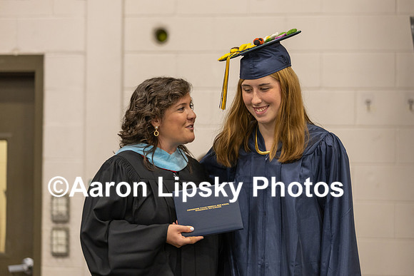 Maeve Finn receives her diploma from Principal Hether McKillop at the commencement ceremony at ConVal Regional High School in Peterborough Saturday morning-4015