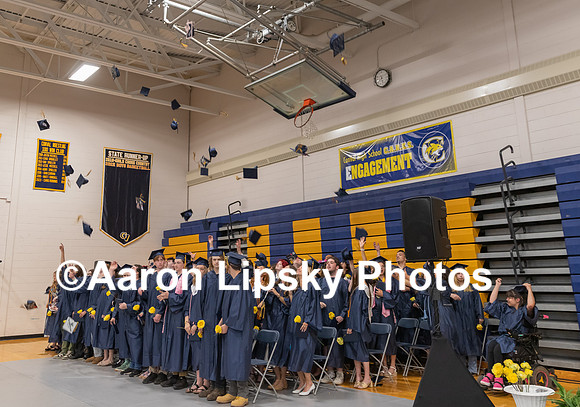 Newly-minted graduates toss their caps in the air after commencement ceremony at ConVal Regional High School in Peterborough Saturday morning-0056